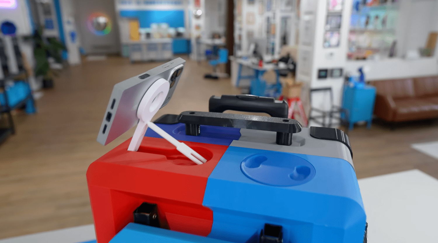 3D-printed suitcase includes foldout table, cup holder, and a secret snack compartment