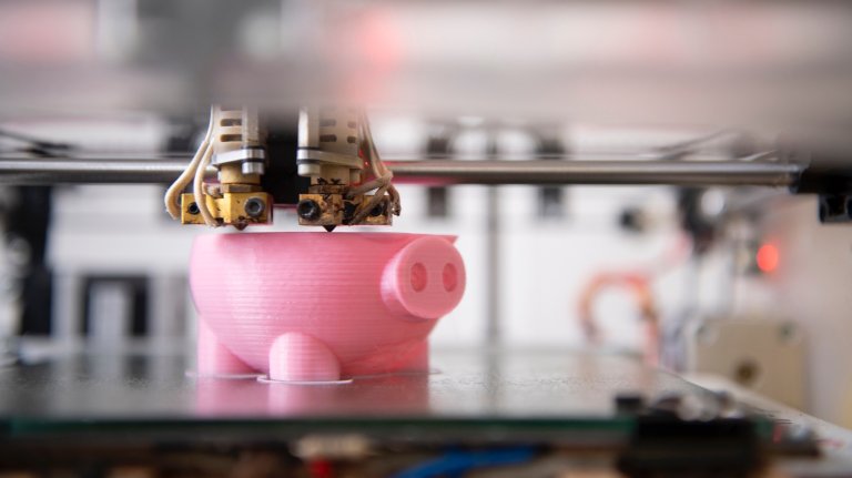 Half way progress of a piggy bank being 3D-printed