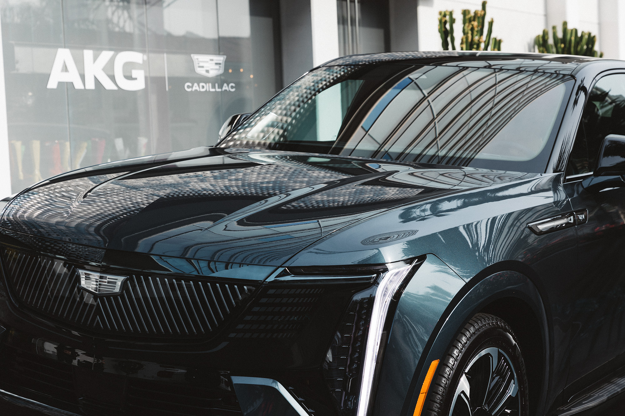A Cadillac ESCALADE IQ sits in front of the Andaz West Hollywood hotel awaiting its passengers to experience the AKG Dolby Atmos sound system on the road to NAMM