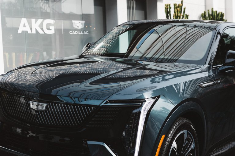 A Cadillac ESCALADE IQ sits in front of the Andaz West Hollywood hotel awaiting its passengers to experience the AKG Dolby Atmos sound system on the road to NAMM