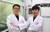 two men in white coats