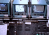 old computer screens and a console