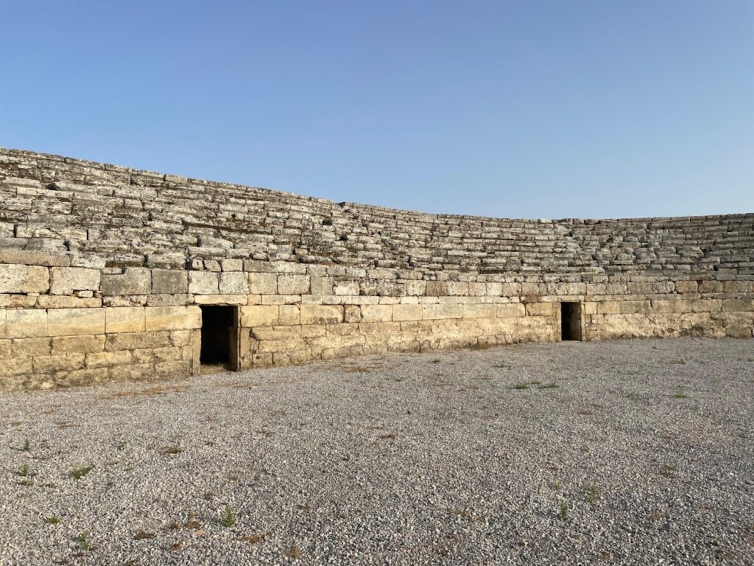 Perge stadium featuring open stone doors