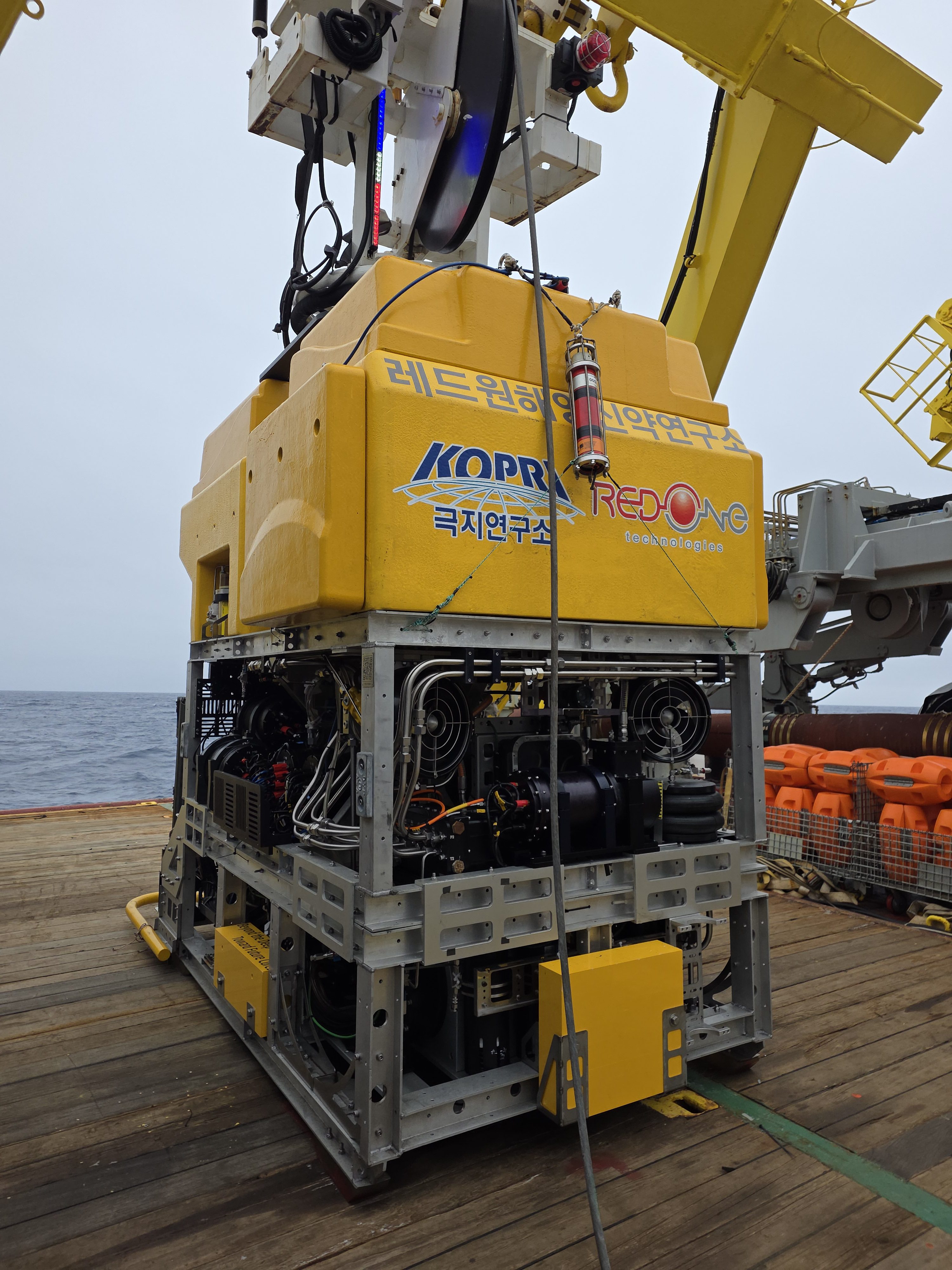 large vehicle on a boat deck