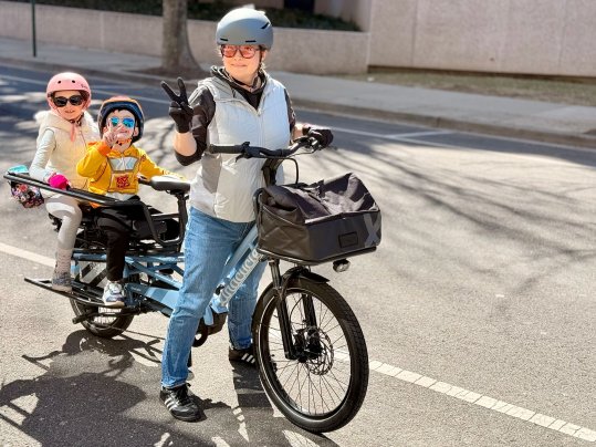The author with a niece and nephew on the Xtracycle Swoop ASM cargo ebike