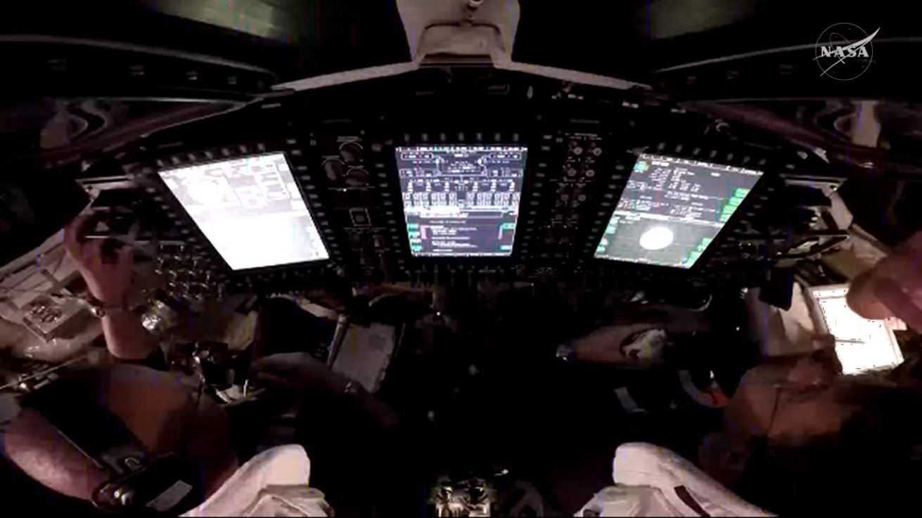 A view over the shoulders of NASA astronauts Victor Glover (left) and Reid Wiseman (right), pilot and commander, respectively, inside the Orion spacecraft as they participate in a proximity operations demonstration. This demonstration tests the spacecraft’s ability to manually maneuver relative to another spacecraft, the interim cryogenic propulsion stage, after separation, using its onboard navigation sensors and reaction control thrusters. Image: NASA
