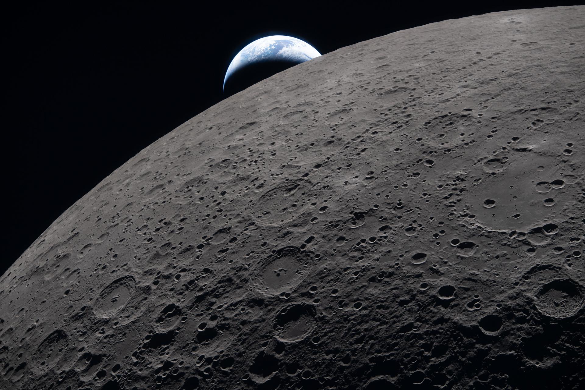 The lunar surface fills the frame in sharp detail