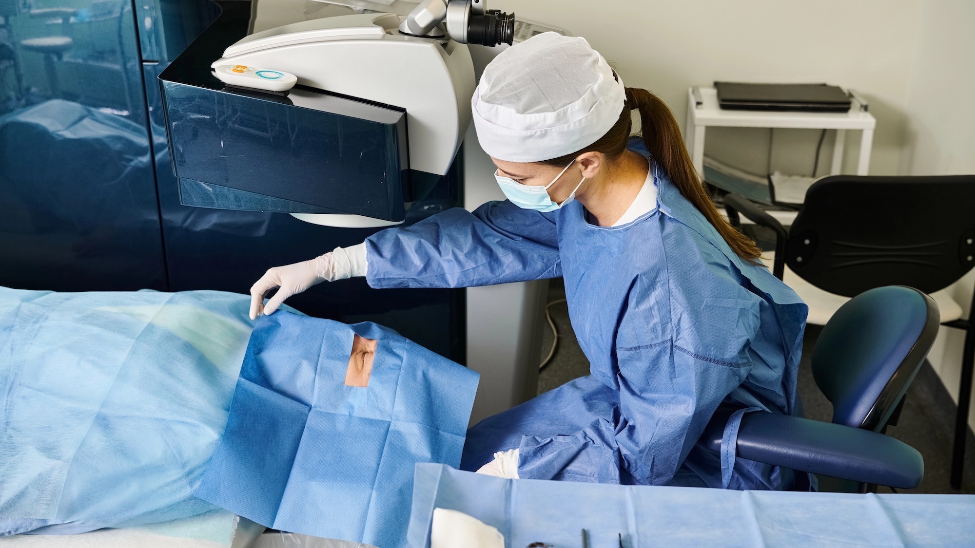 a surgeon performing an eye surgery