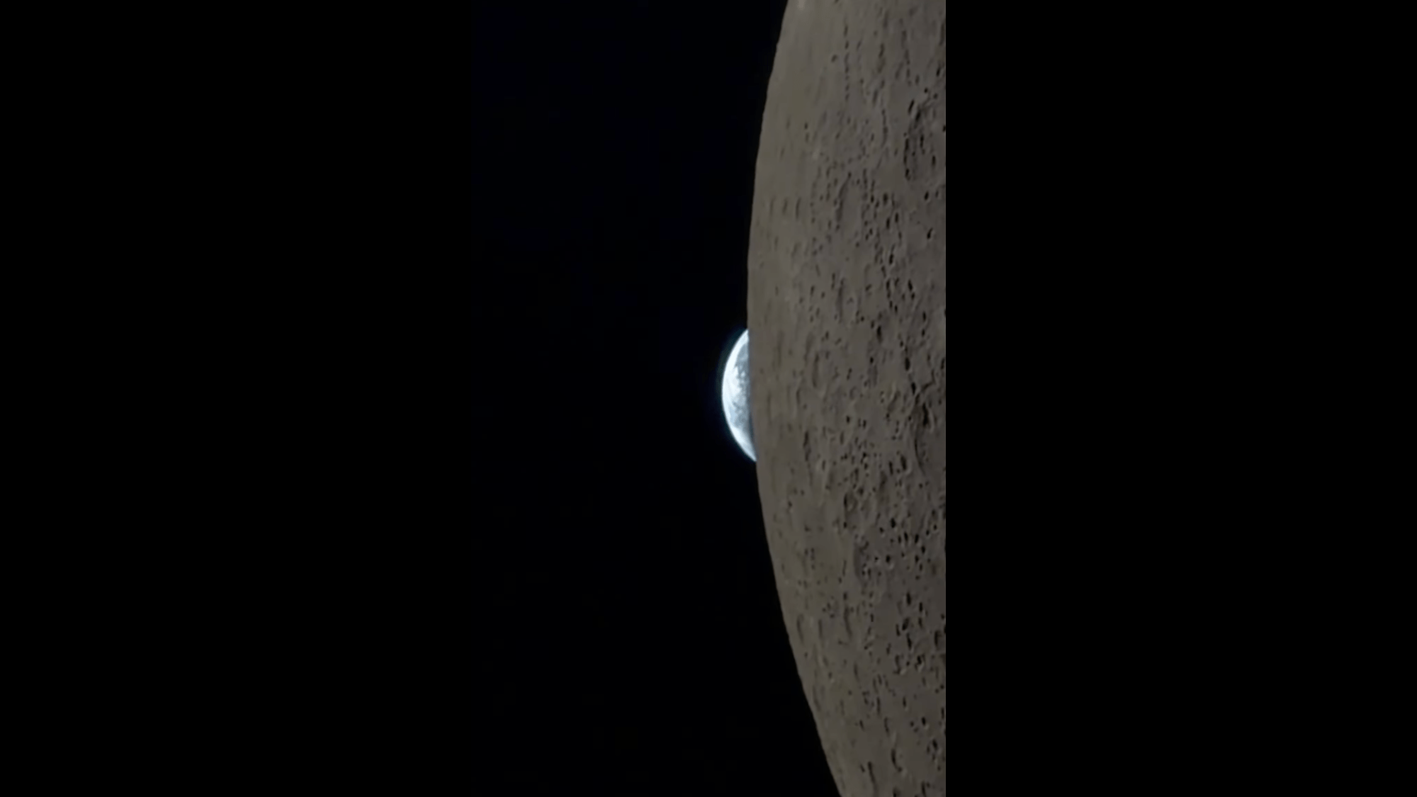 the earth is setting behind the moon