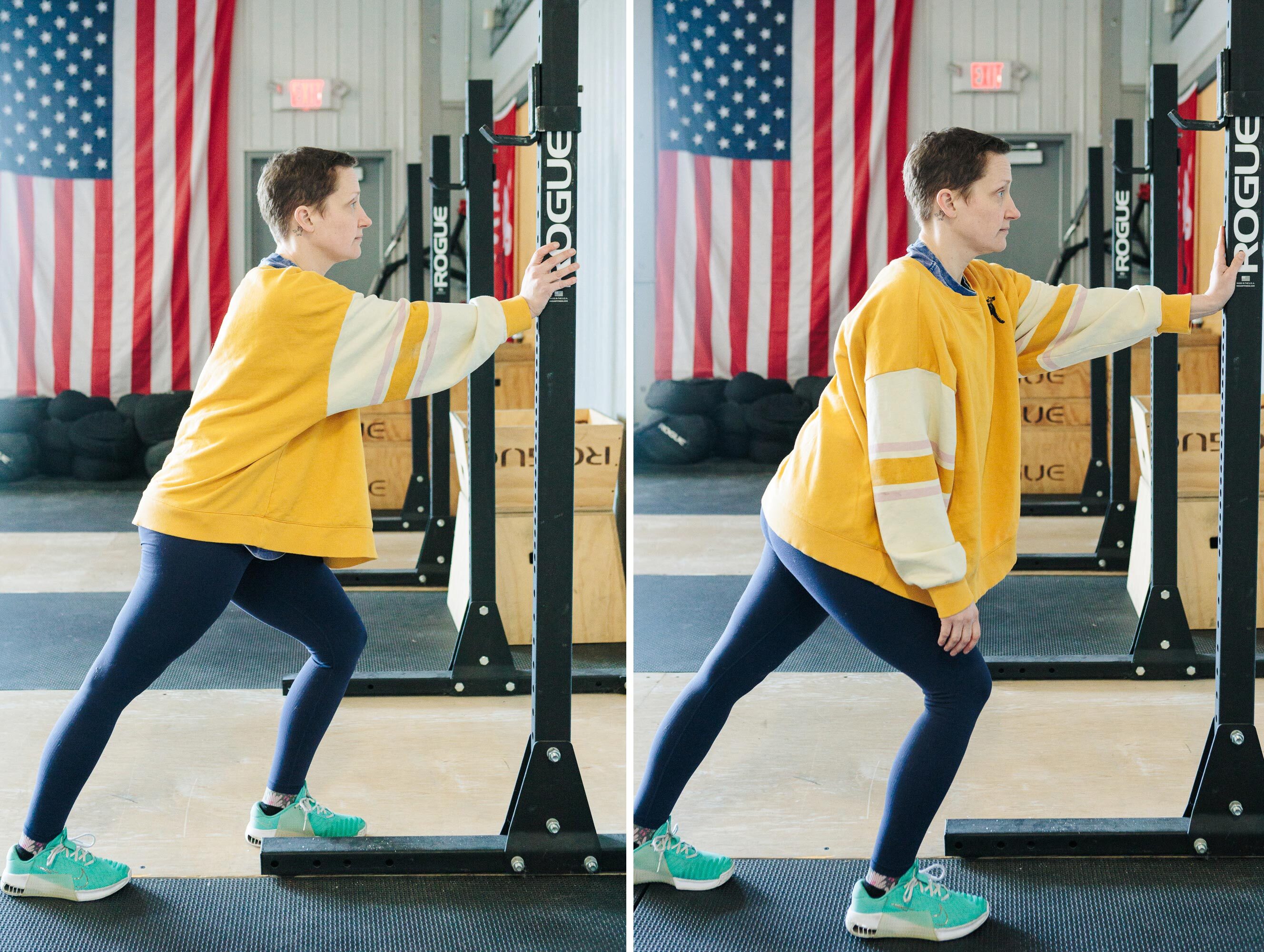 person stretches toward weight bench