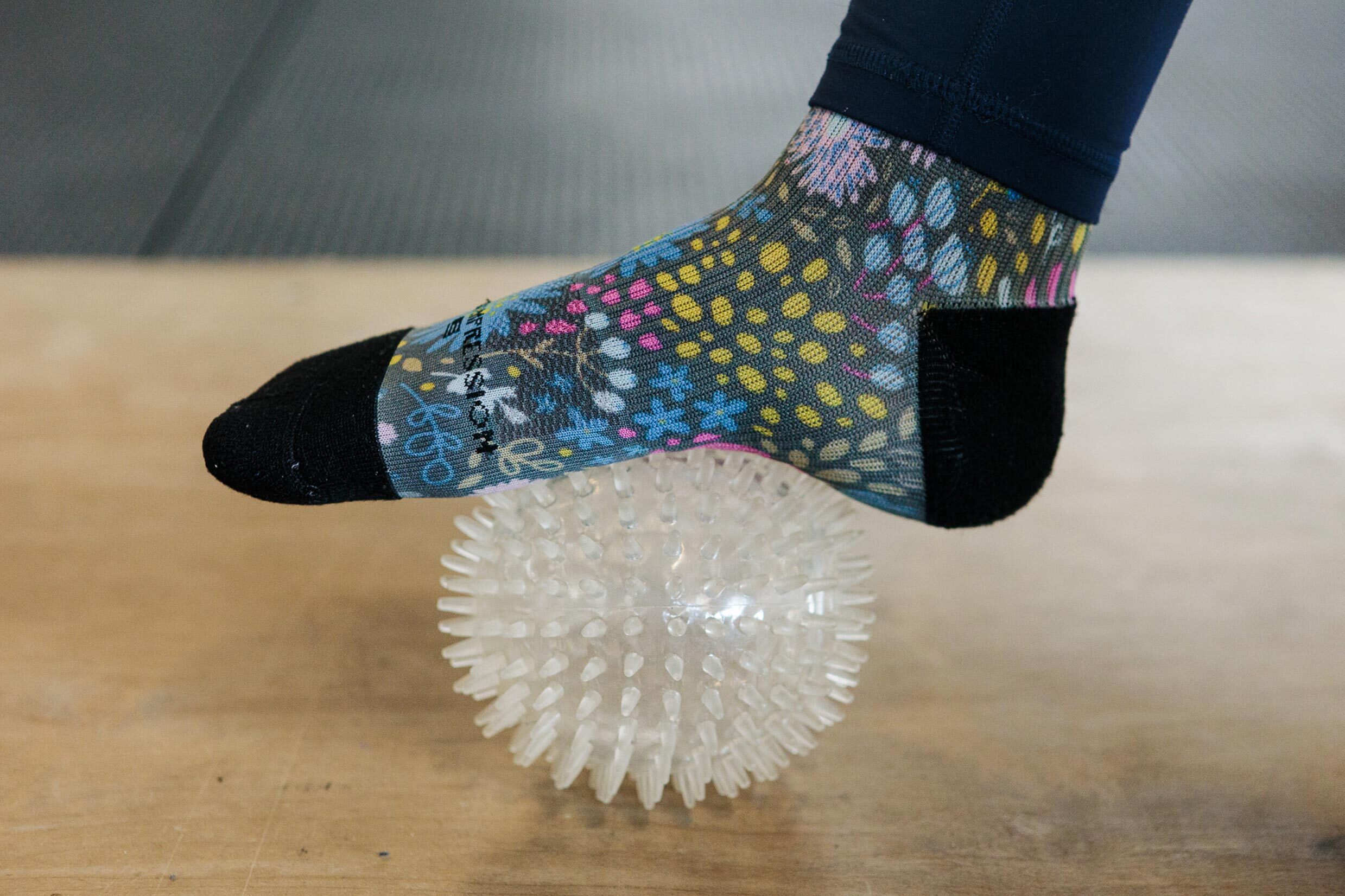 foot rolling on spiky ball