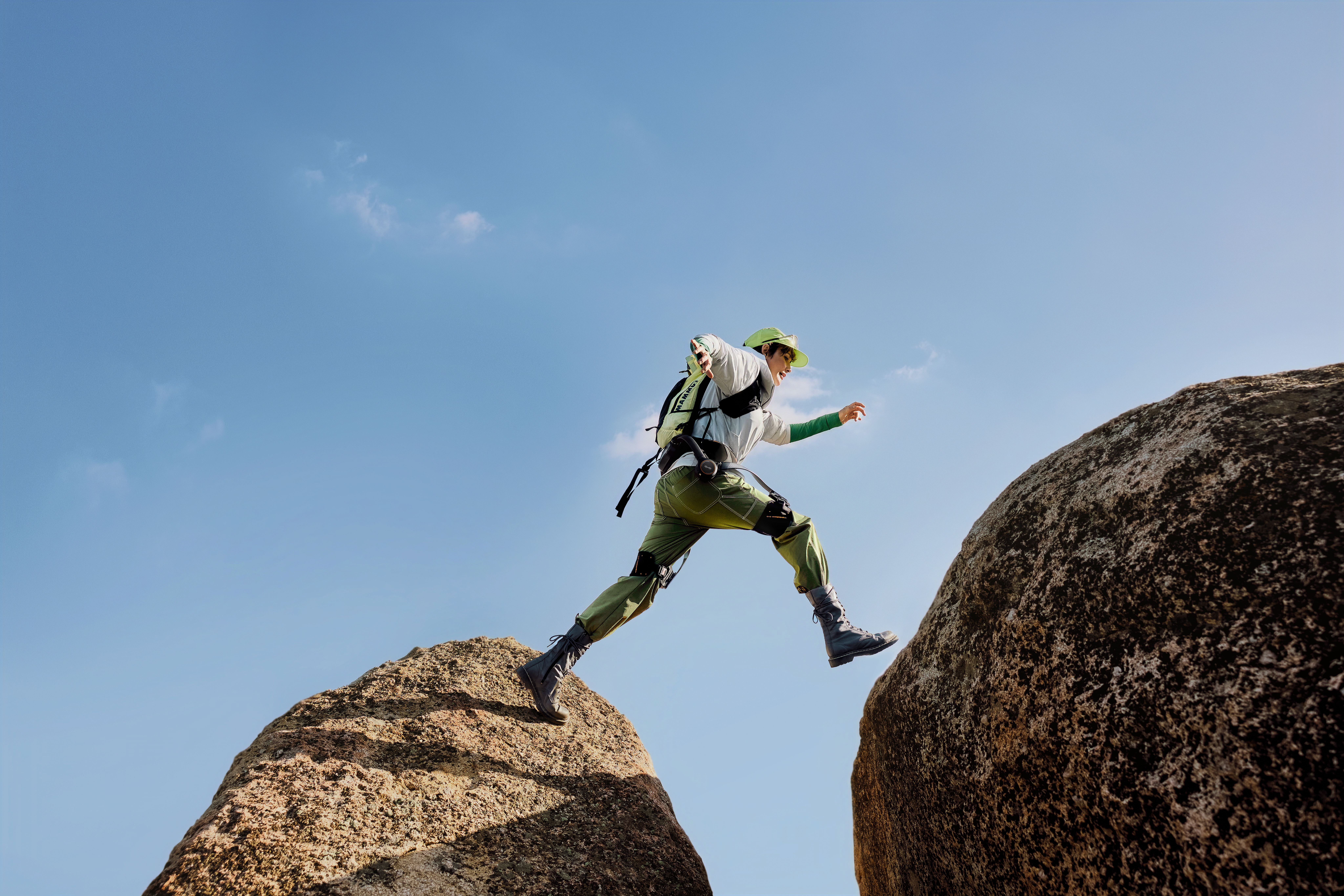 New Hypershell X Series on a hiker jumping over a gap