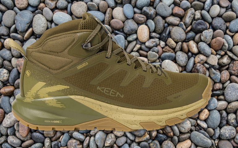 KEEN Targhee Apex Mid Waterproof Hiking Boots on a background of stones