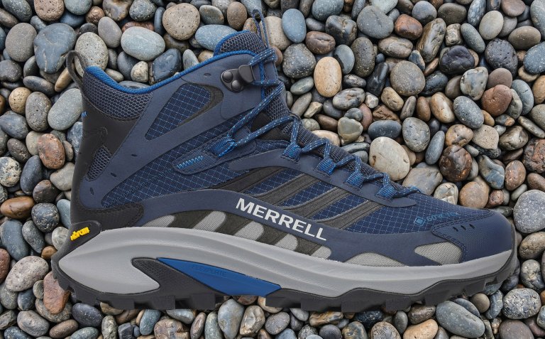 Merrell Moab Speed 2 Mid GTX Hiking Boots (Men's) on a background of pebbles
