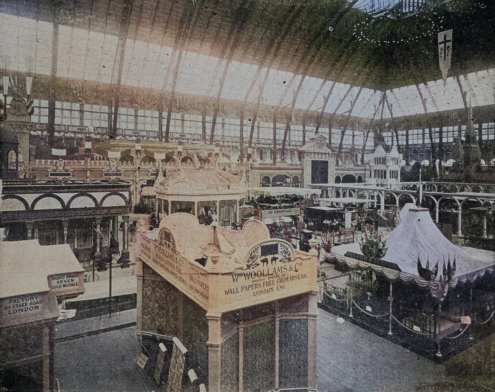 A historic color photograph of the Chicago World's Fair. It shows multiple different displays and exhibits. 