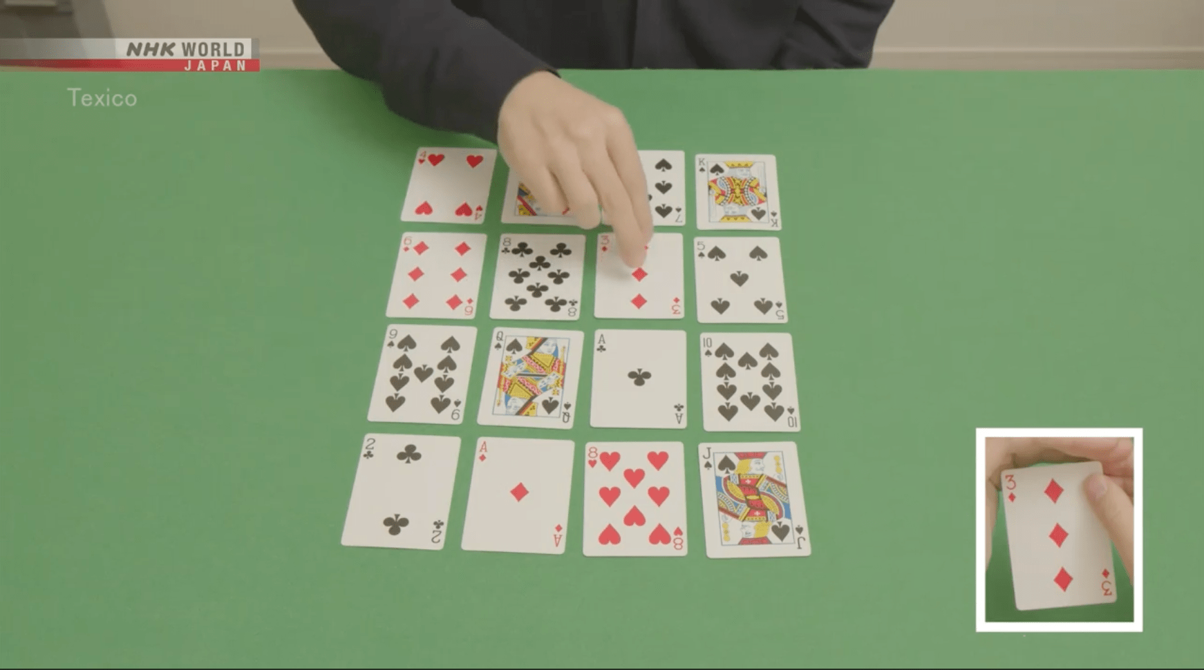 playing cards on a green table
