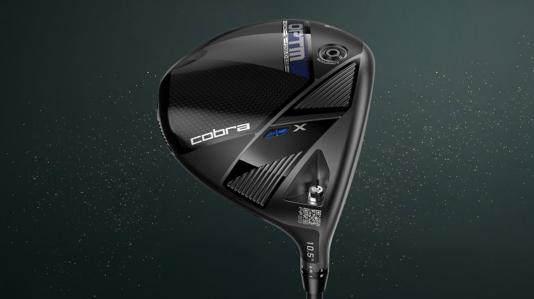 A Cobra OPTM X Driver on a speckled Father's Day Gift Guide background