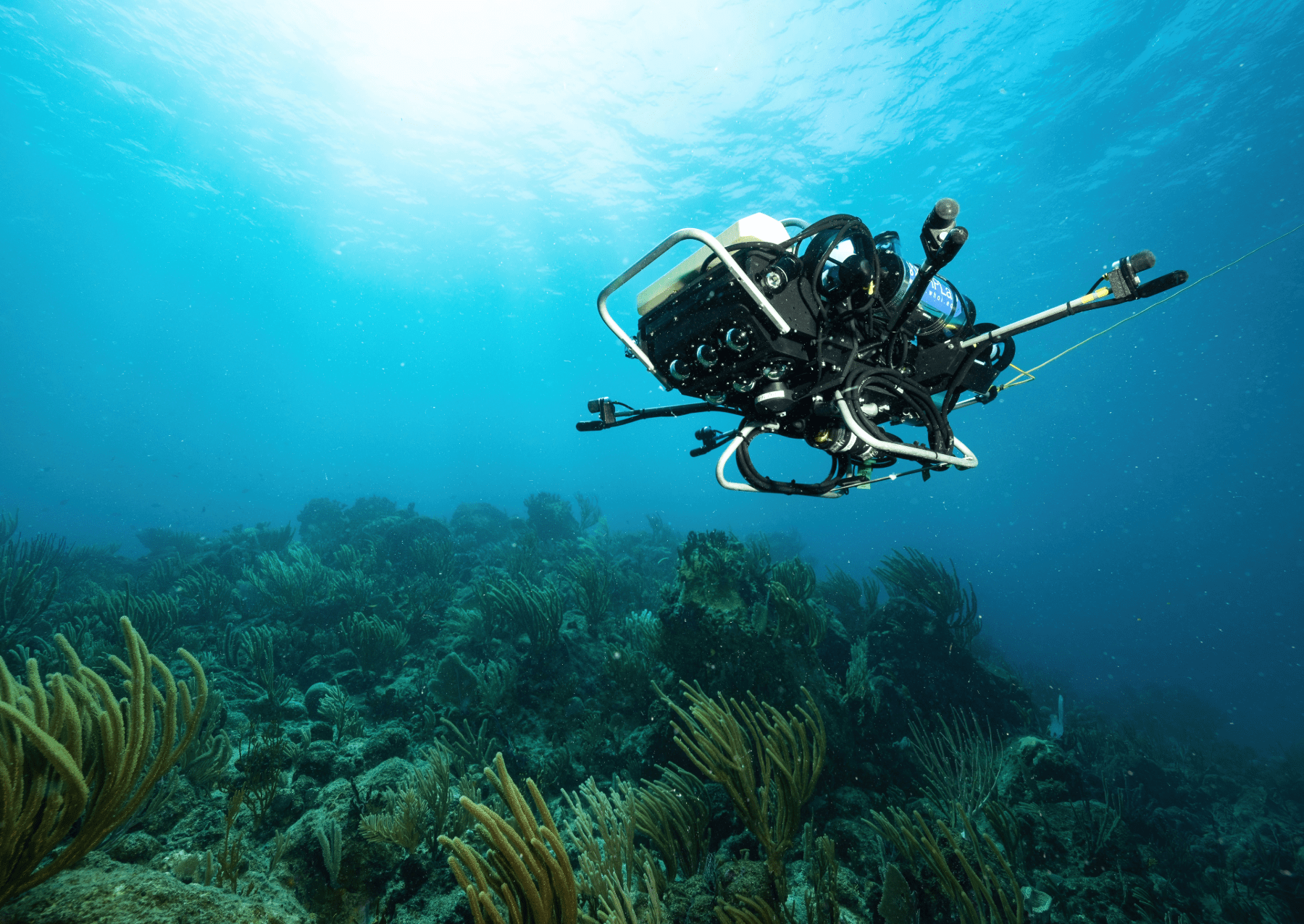 an autonomous underwater robot exploring a coral reef