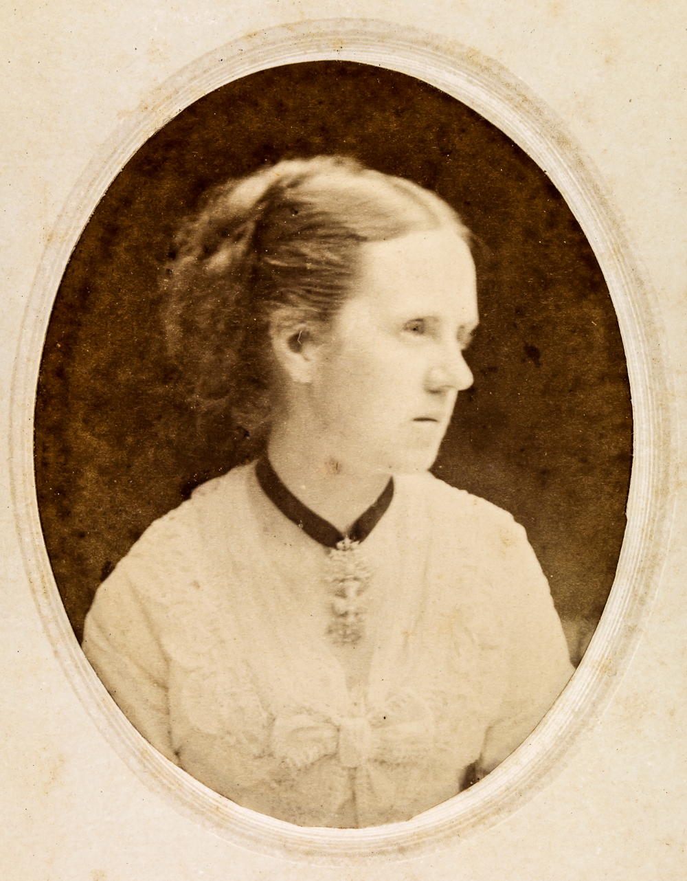 a black and white photograph of a young woman named henrietta darwin