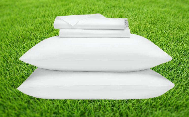 Brooklinen sheets against a grass backdrop
