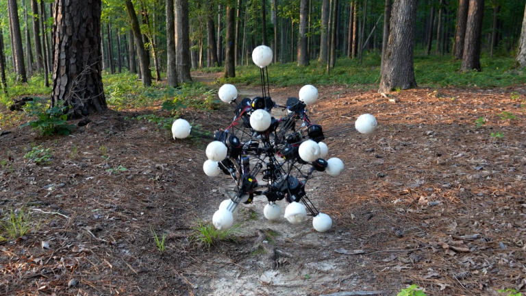 a spherical robot with white spokes connecting a series of white balls