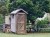 Outside Dunny toilet on a rural property in Queensland Australia. Made from wood scraps and corrugated iron and other recycled items.
