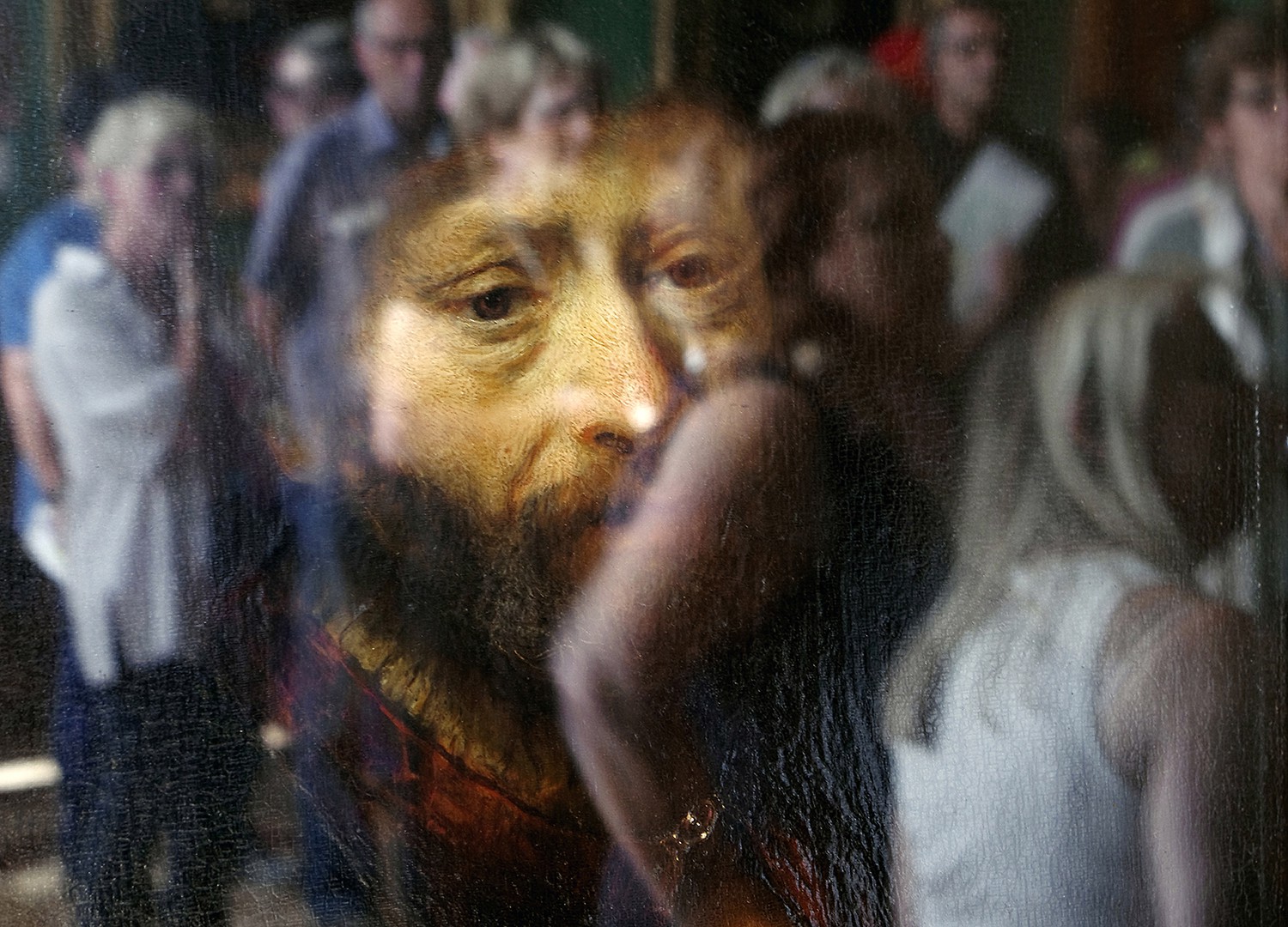 reflection of modern people on old painting 