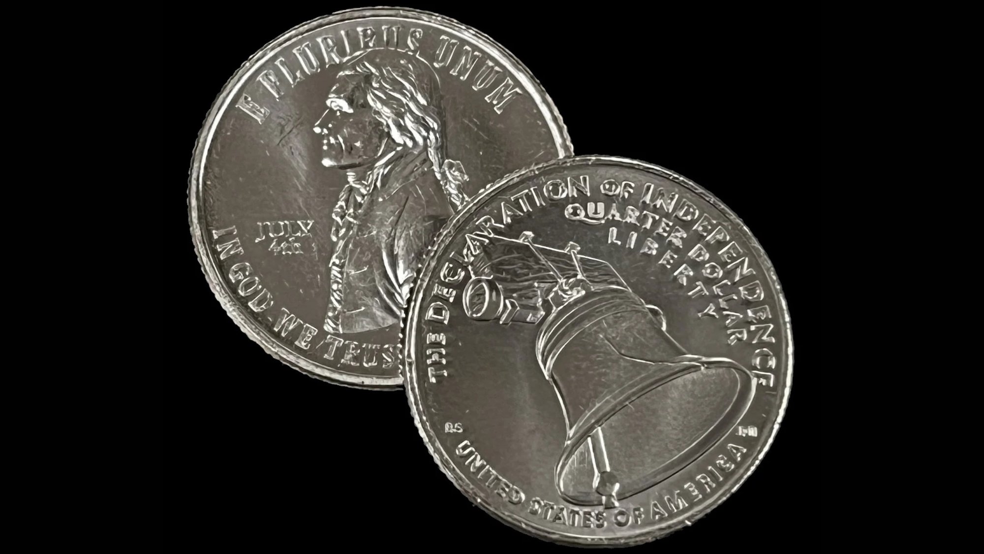 Front and back of limited edition July 4th quarter featuring Thomas Jefferson on the front and the Liberty Bell on the back