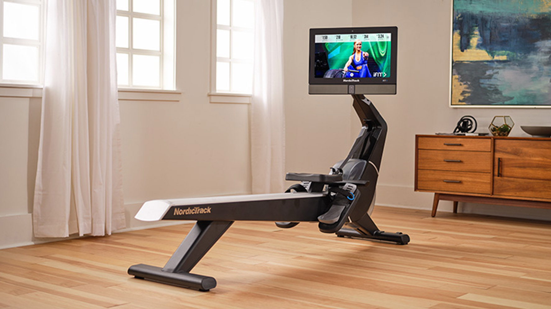 NordicTrack RW900 Rower in a fancy room with the screen on