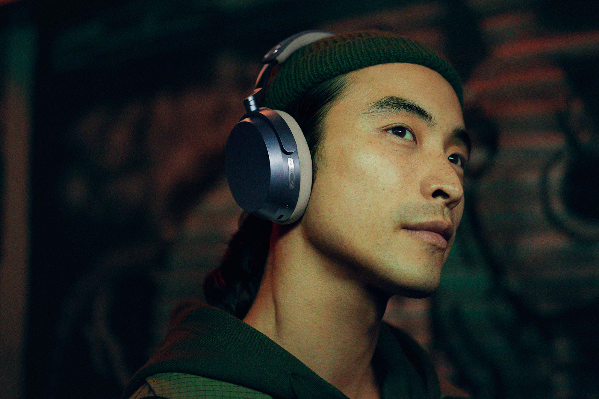 The denim-colored Sennheiser Momentum 5 wireless headphones on some K-Pop artist's head