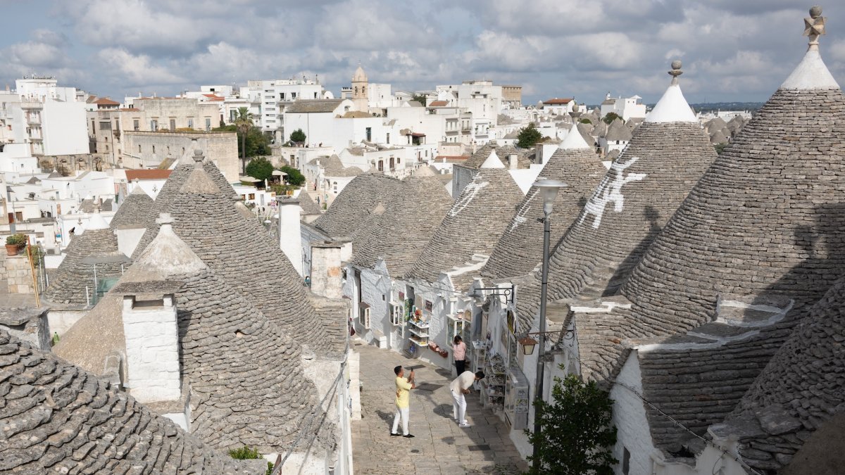 Italians are beating the scorching heat inside ingenious medieval homes