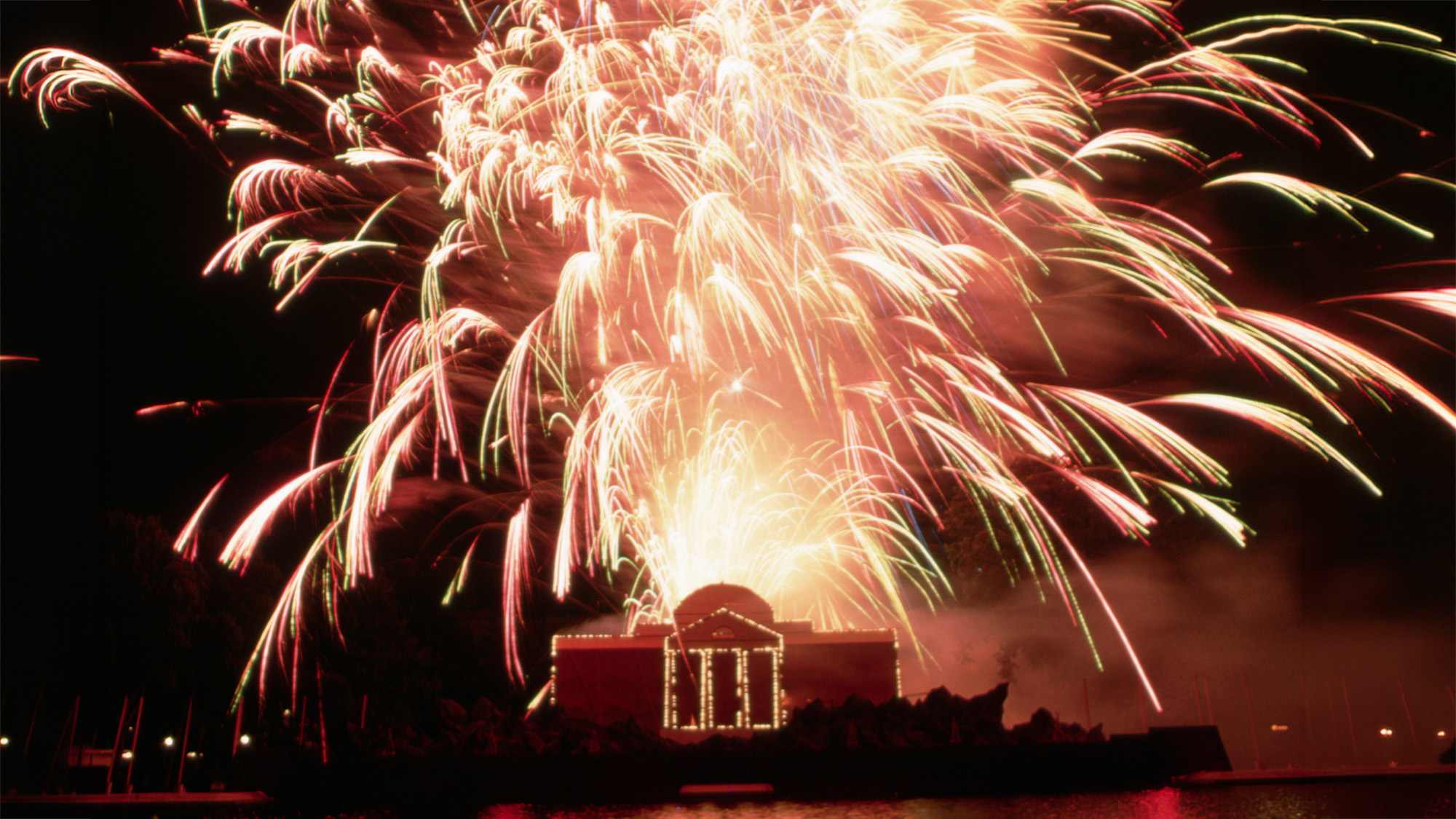 A fireworks display was part of the Mellon Art Gallery's Eye on Jefferson exhibit at the base of Capitol Hill. The fireworks explode over a replica of Jefferson's home, Monticello.