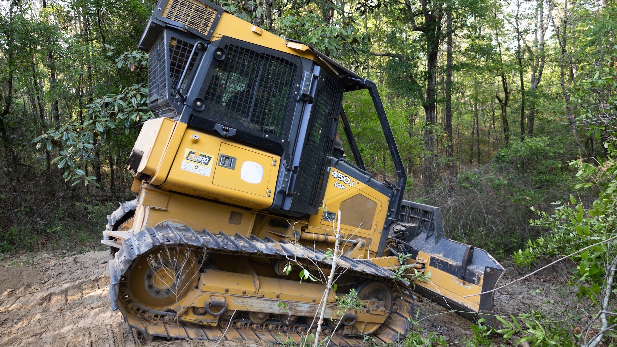 a bull dozer going down a hill