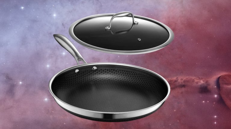 Hexclad Hybrid Fry Pan with Lid 12-inch against a space background