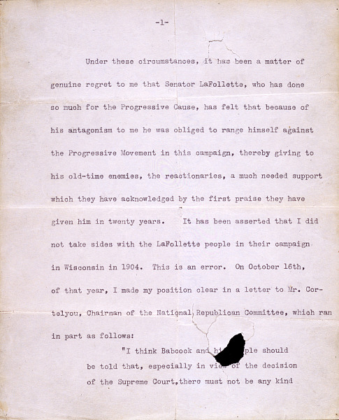 A page from Roosevelt’s life-saving speech with a bullet hole towards the bottom