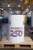 a long white time cylinder with the text Amerca250 on it