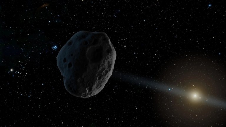 This artist’s concept depicts a near-Earth asteroid with an elongated orbit. A few objects such as these can exhibit significant perturbations in their motion around the Sun and, like the asteroid 1998 SH2, could turn out to be regular comets with a weak tail and coma (the gas and dust around a comet’s nucleus). NASA/JPL-Caltech