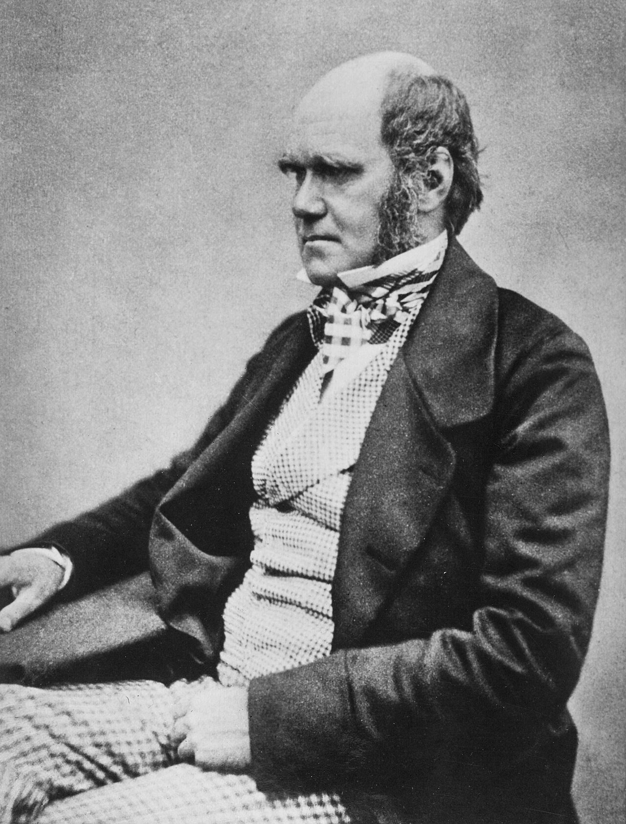 Middle aged Charles Darwin poses for a photograph around 1854.