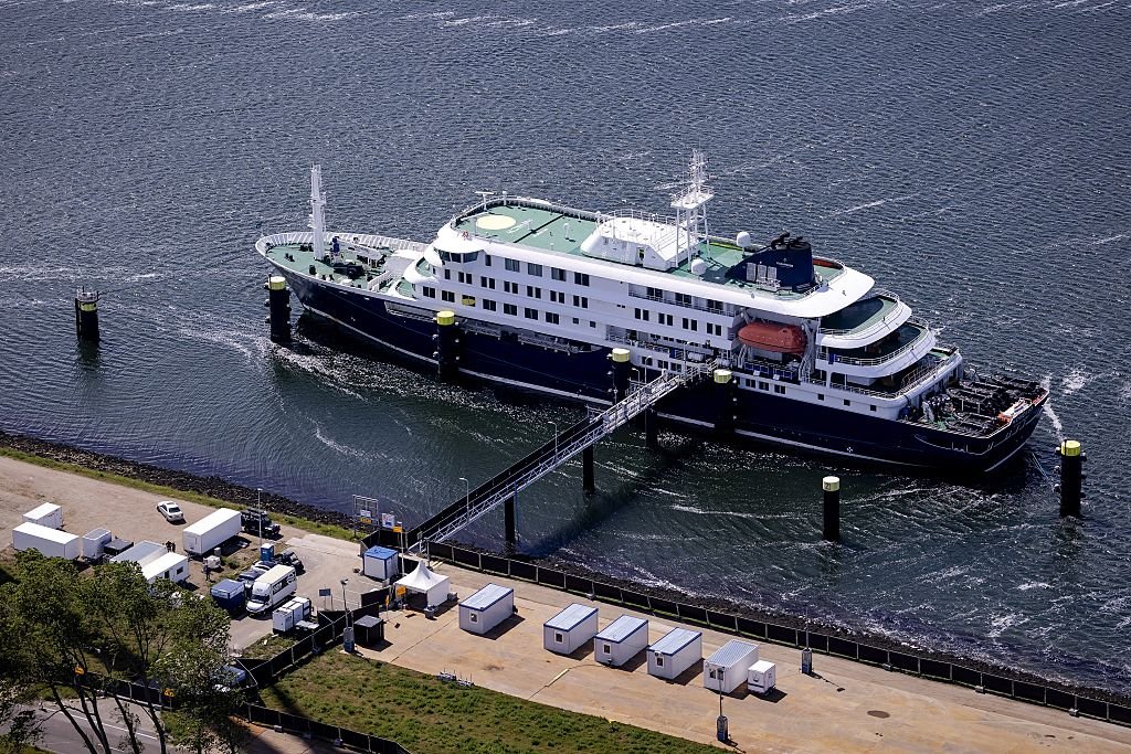 Aerial view shows the Dutch Hantavirus-hit cruise ship MV Hondius docked after arriving at the port of Rotterdam on May 18, 2026.