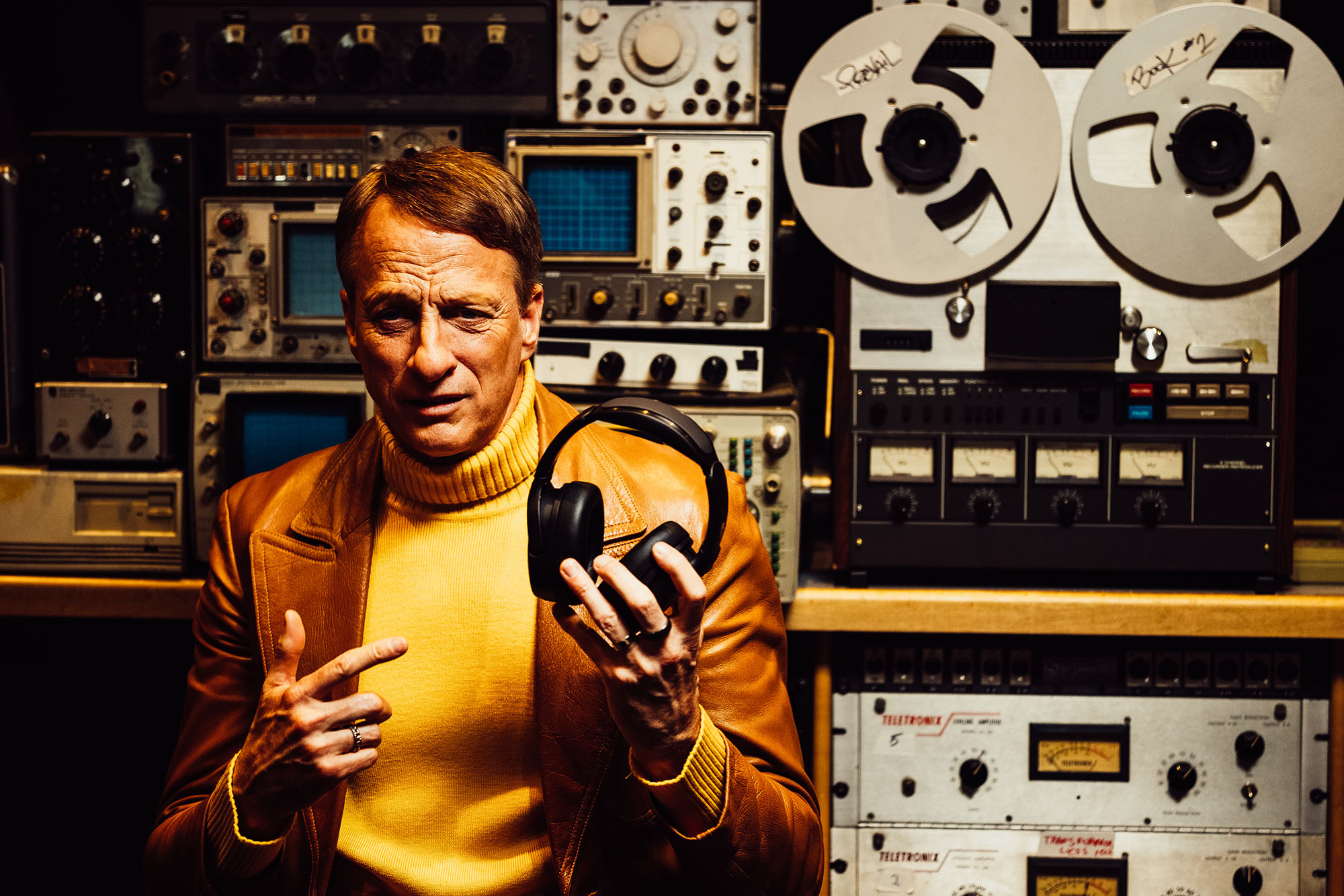 Skullcandy brand ambassador Tony Hawk dressed as the "mastermind" behind the brand's mission to provide bigger better bass