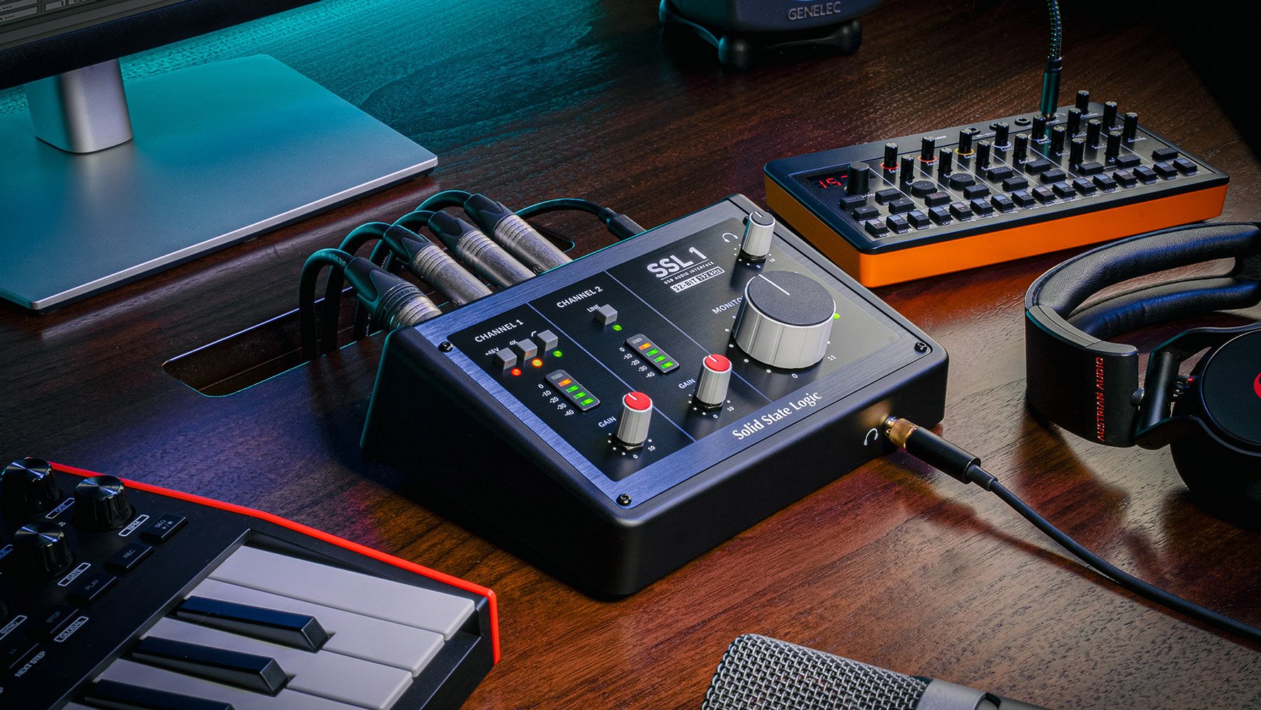 Solid State Logic SSL 1 audio interface review on a table with other recording equipement.