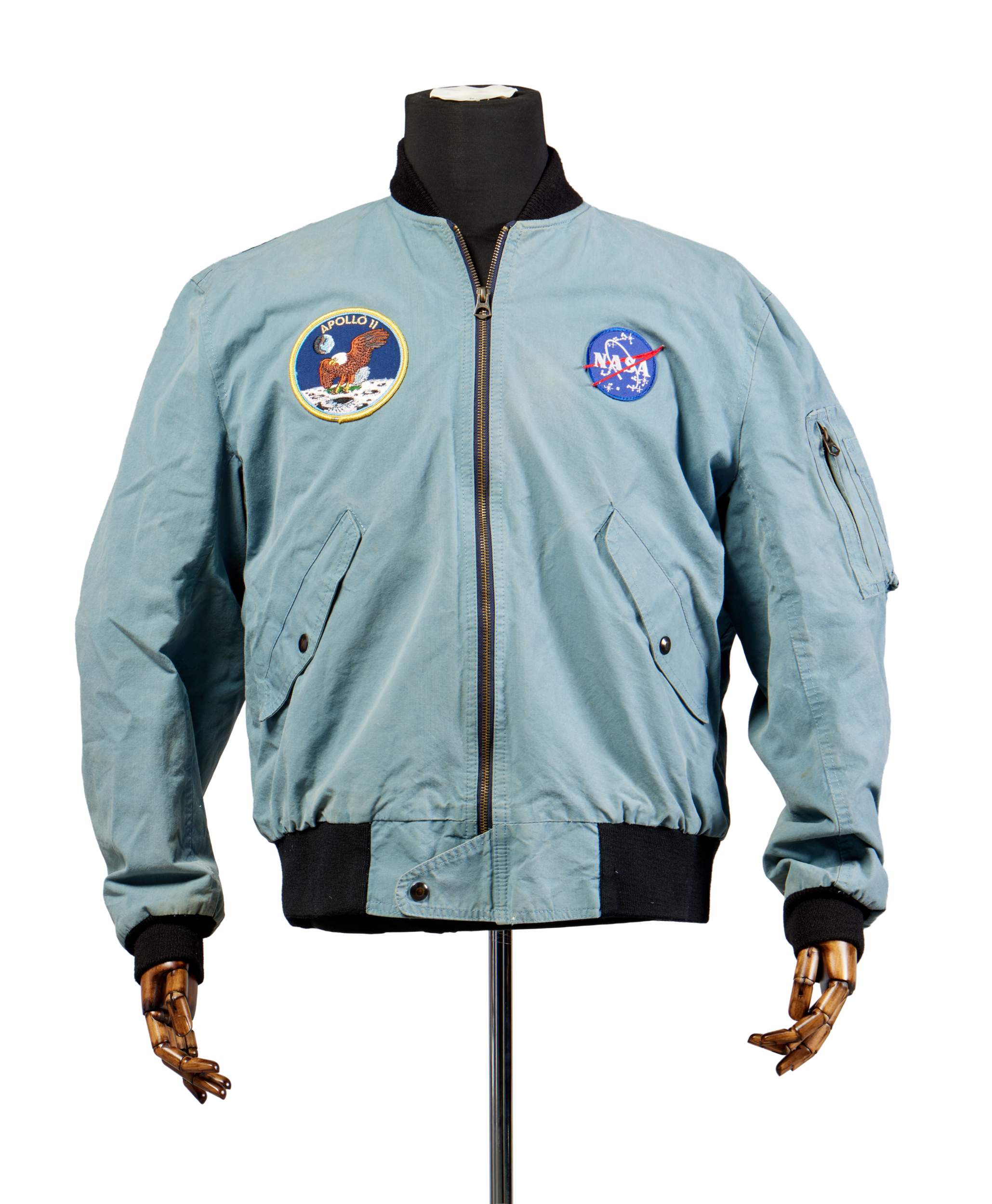 a blue aviator's jacked with an apollo 11 patch