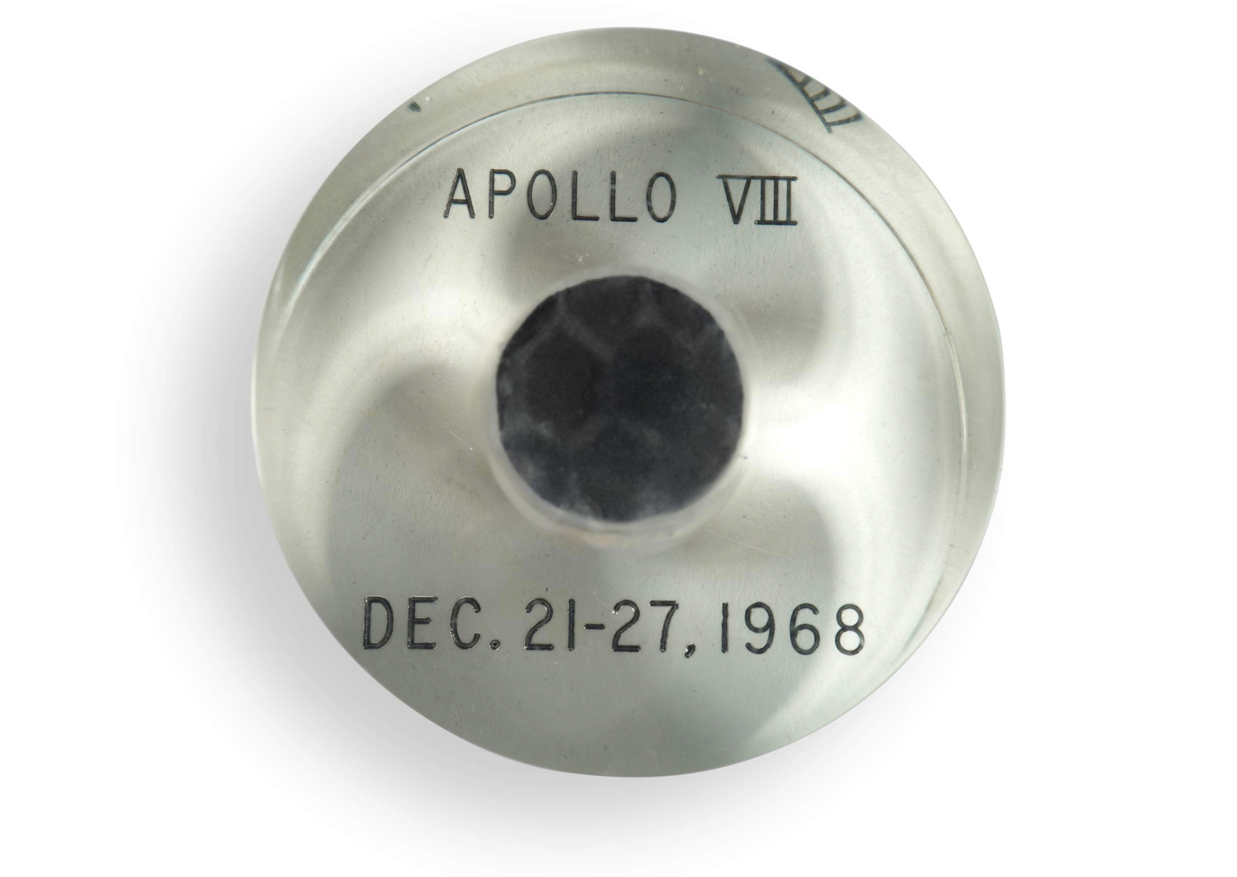a silver disk with the words apollo 8 on it