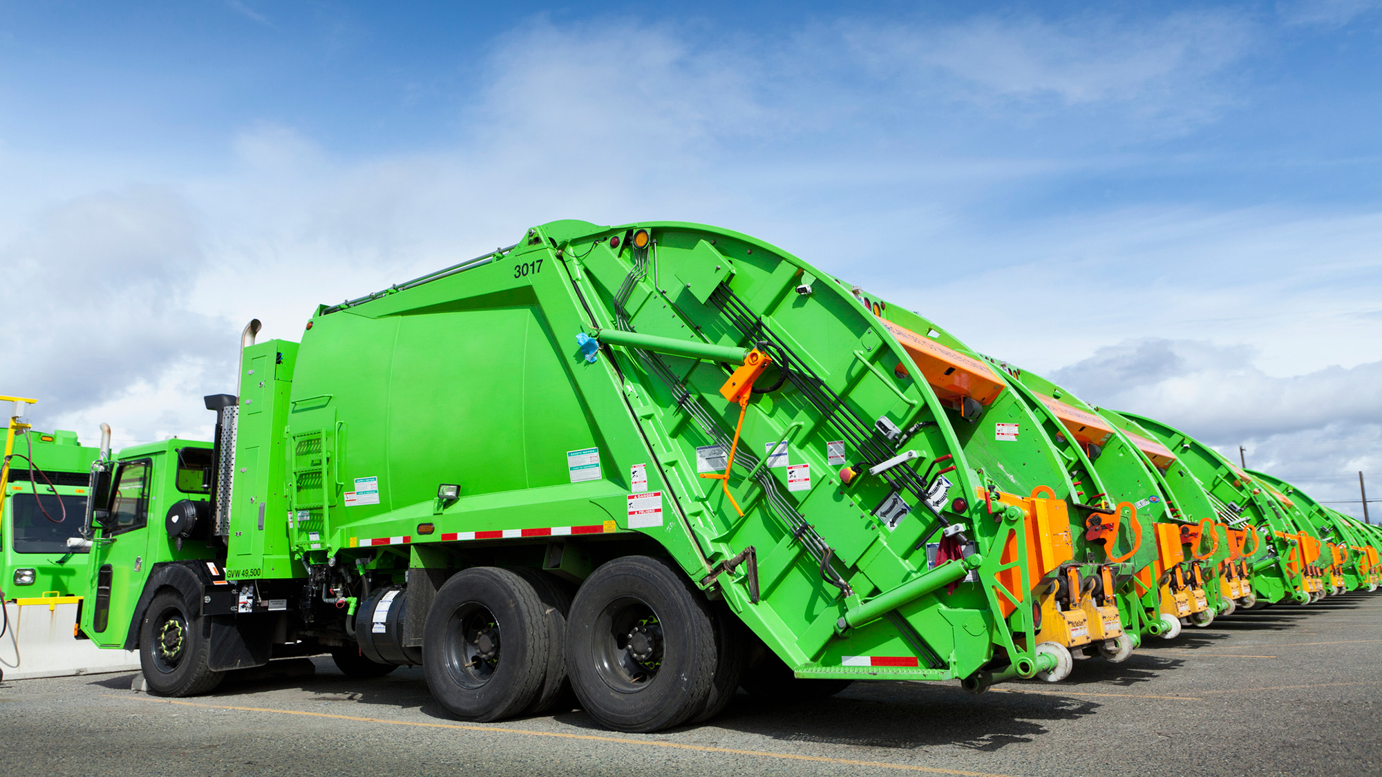 popsci.com - Sarah Kuta - How do garbage trucks work?