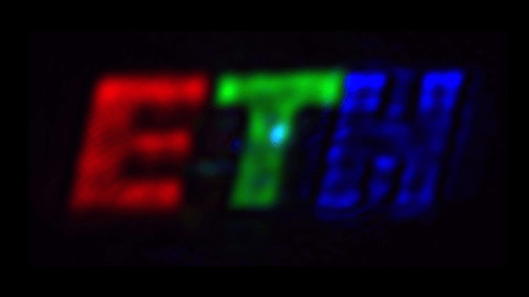 the letters ETH in new pixels. the e is red, the t is green, and the h is blue