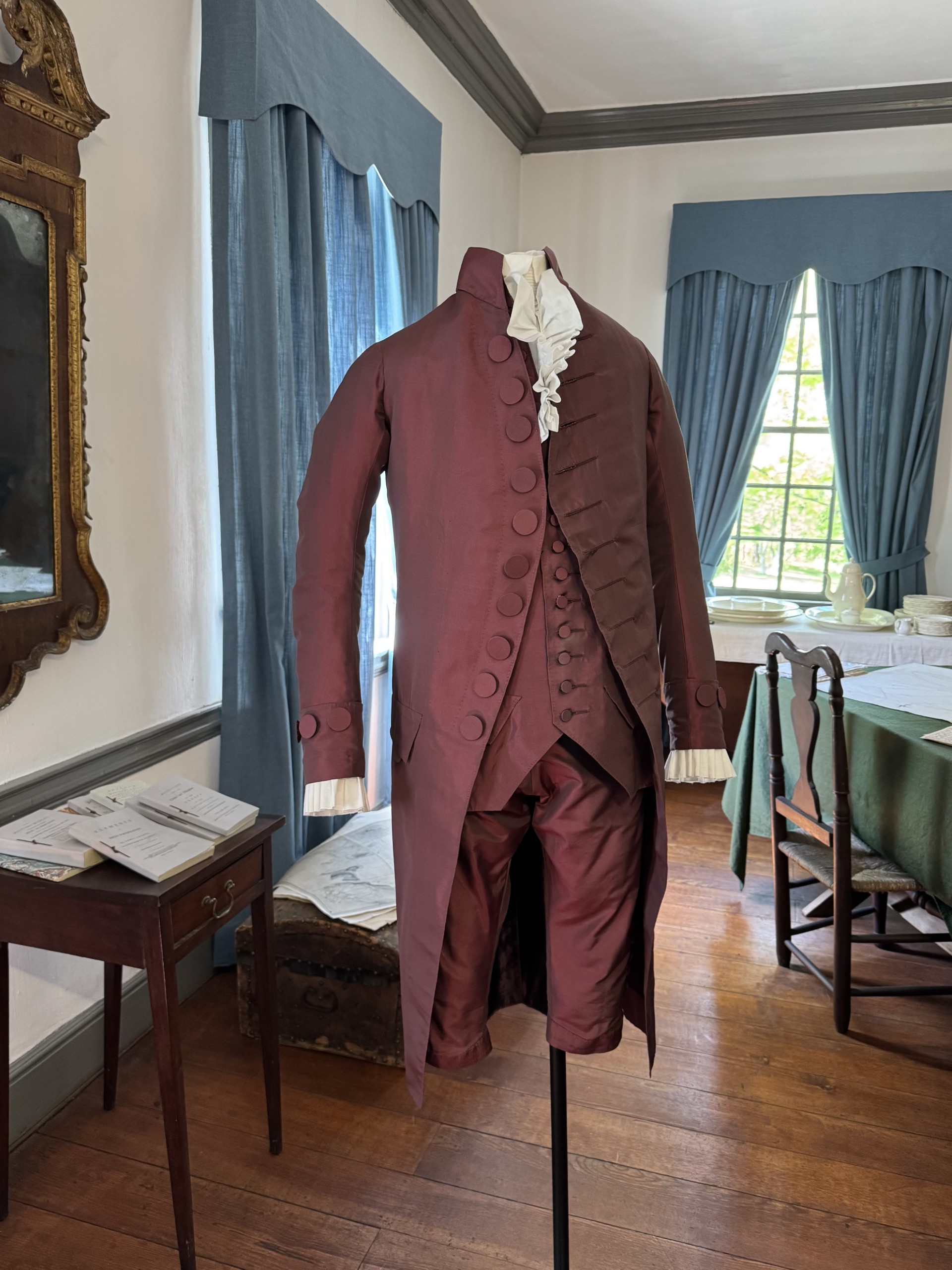 Purple 18th century button down coat.