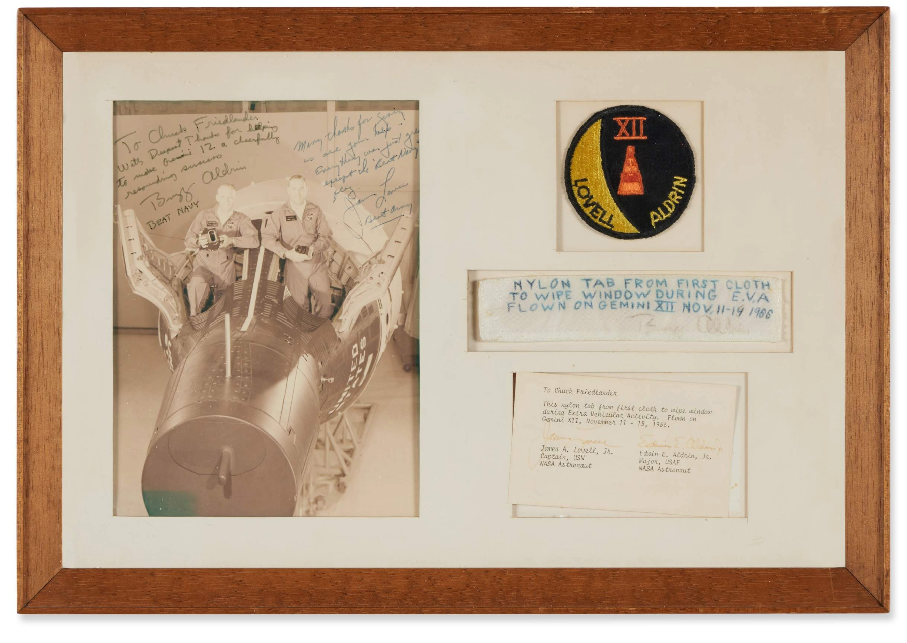 a frame with a certificate and piece of cloth