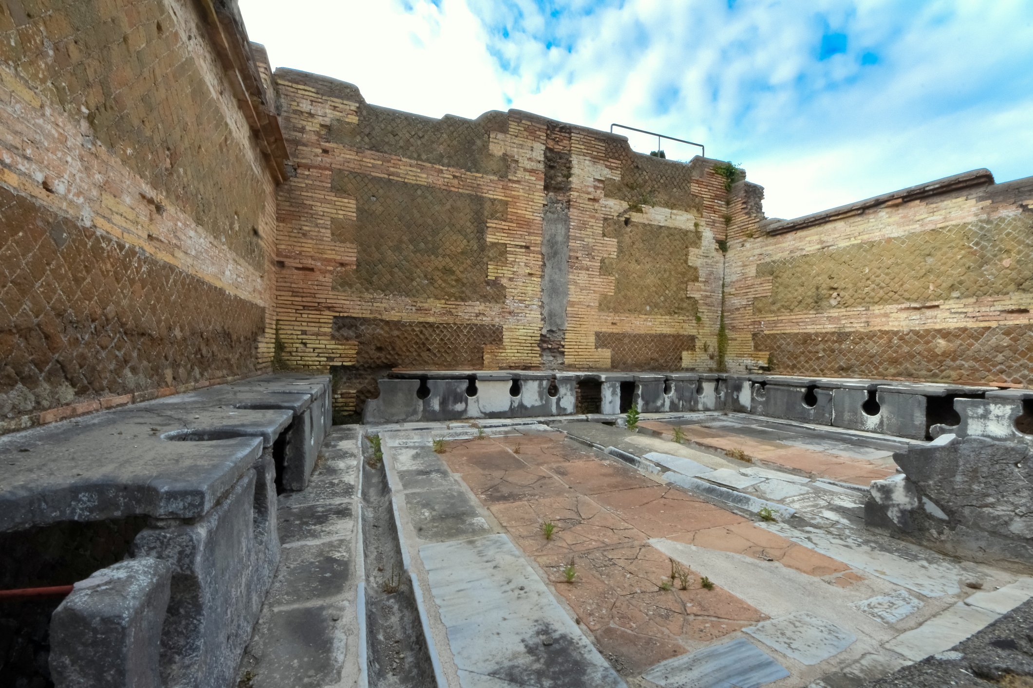 Photograph of an ancient Roman latrine.