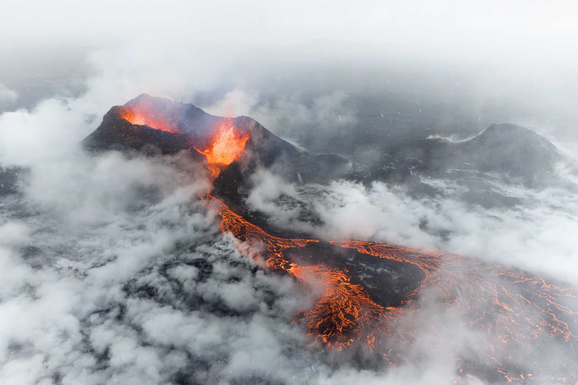 lava in crater as it rains