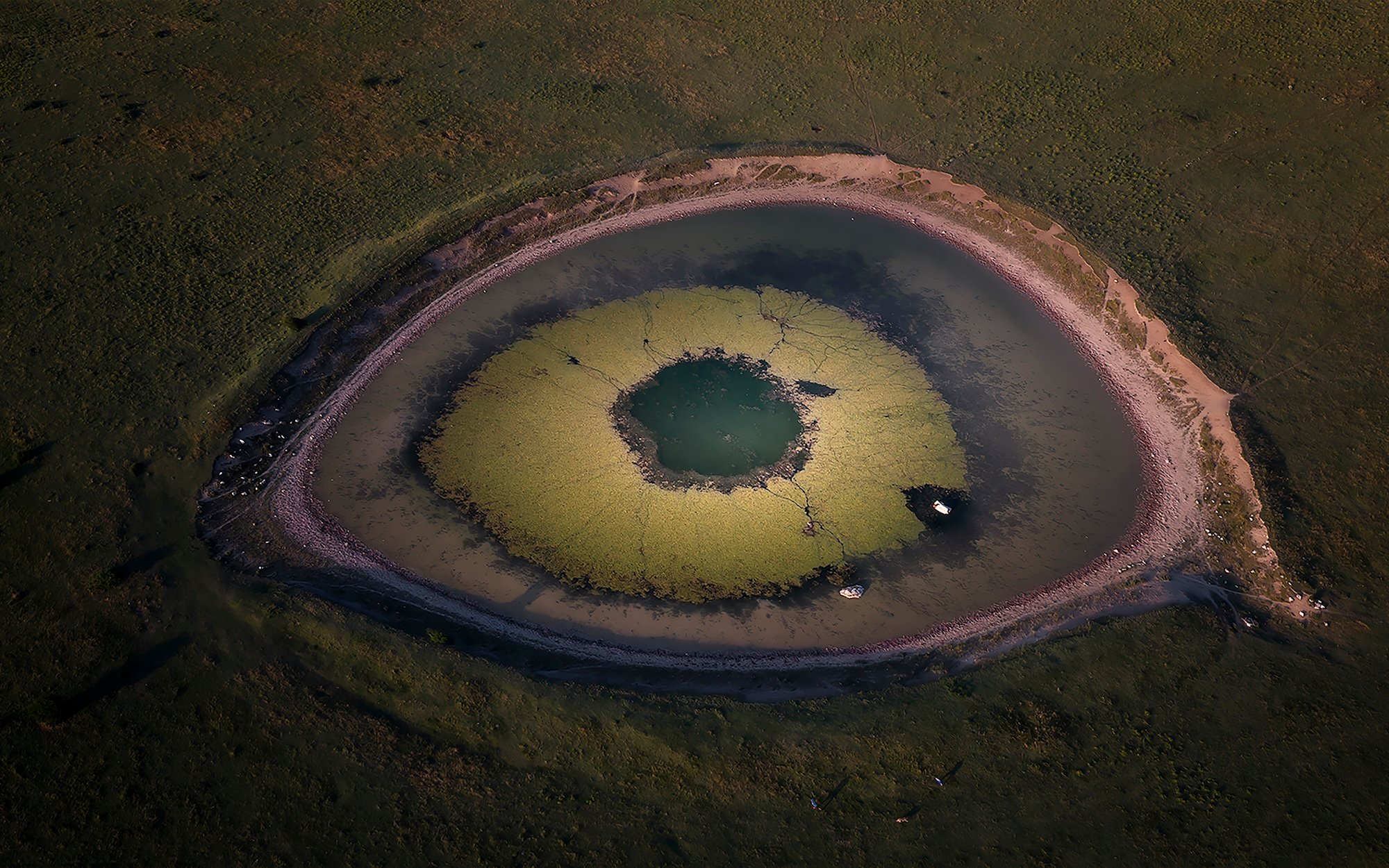 crater lake that looks like a green eye